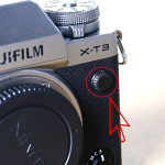 Camera shutter cover button