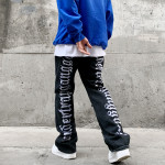 Retro Back Gothic Alphabet Embroidery Ripped Micro Horn Denim Pants