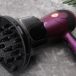 Hair dryer with wind hood