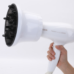 Hair dryer with wind hood