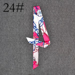 Long Scarf Tied With A Small Ribbon Wrapped Around The Handle Silk Scarf