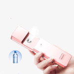 Portable moisturizing spray instrument